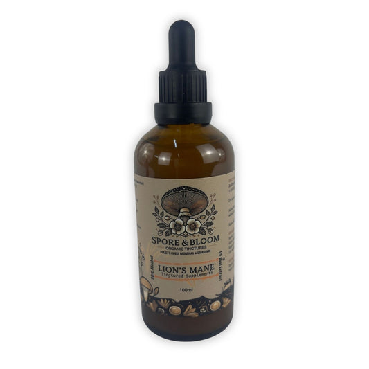 A 100ml tincture bottle of Spore & Bloom Lion's Mane with a dropper, featuring a beige label with decorative elements and text.