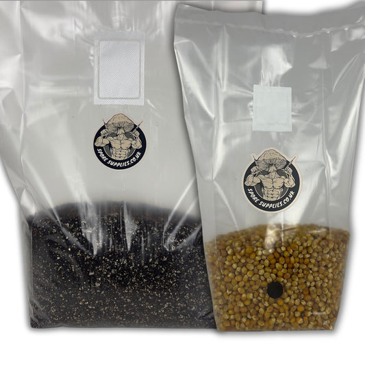 Two sealed plastic bags, one with popcorn grain and the other with a brown CVG substrate, both labeled with a mushroom and the text 'Mushroom Grow Kit'.