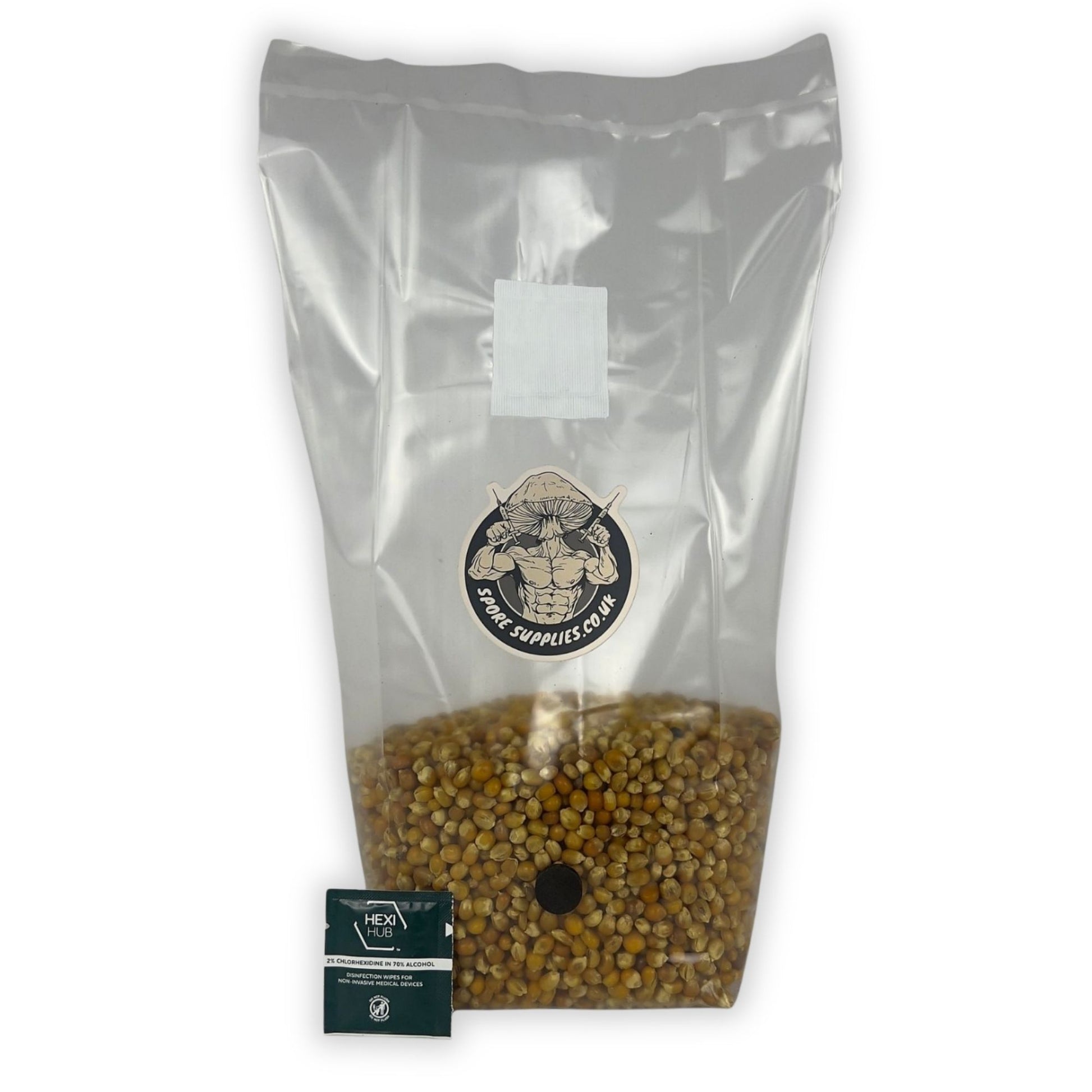 A clear plastic bag filled with popcorn grains, with a label indicating it is a sterile substrate for growing mushrooms.