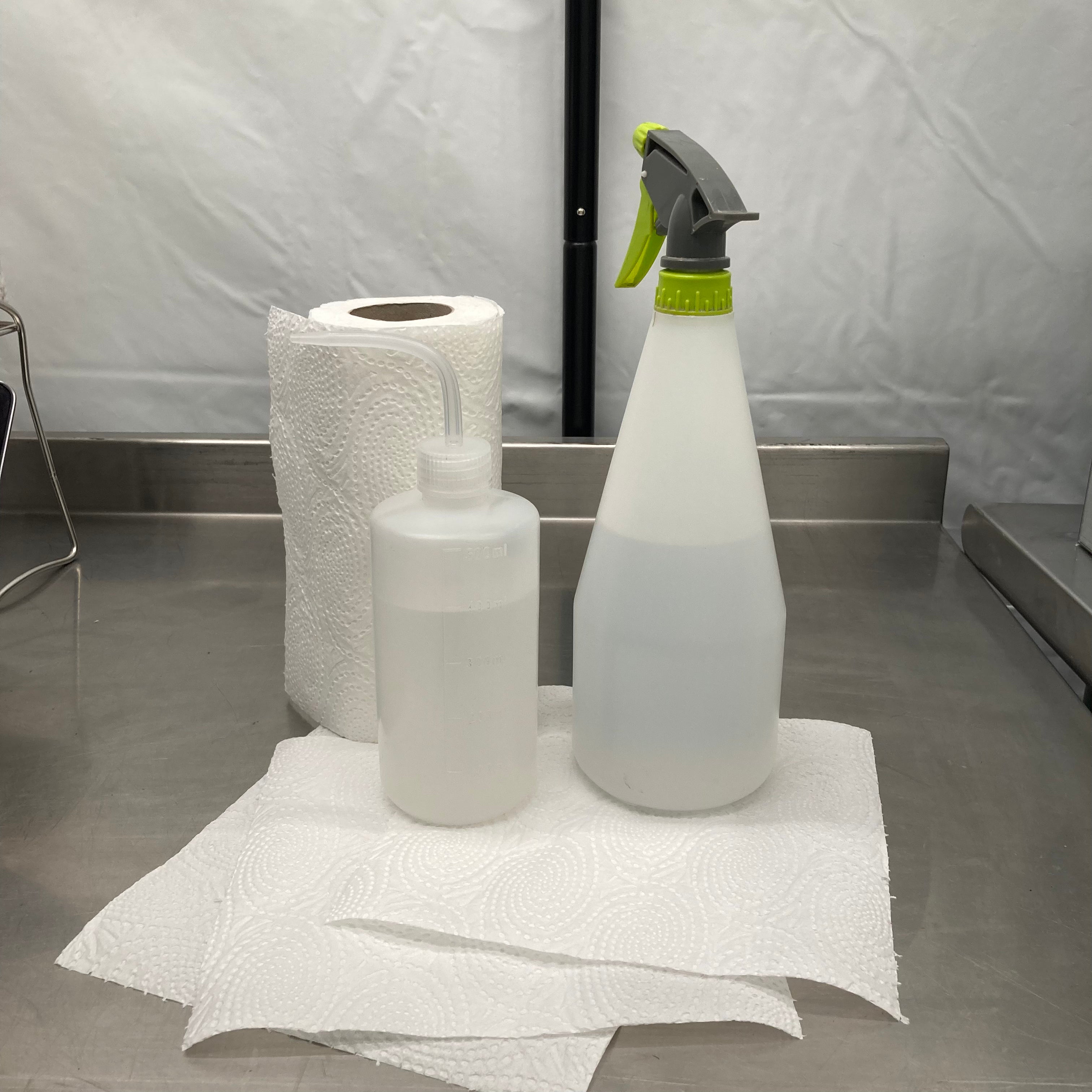 isopropyl alcohol with kitchen roll for wiping